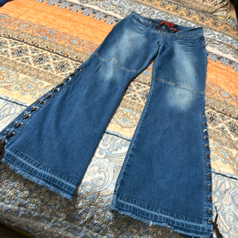 Size 7 Bongo distressed jeans , gently used with laced up legs and fly
